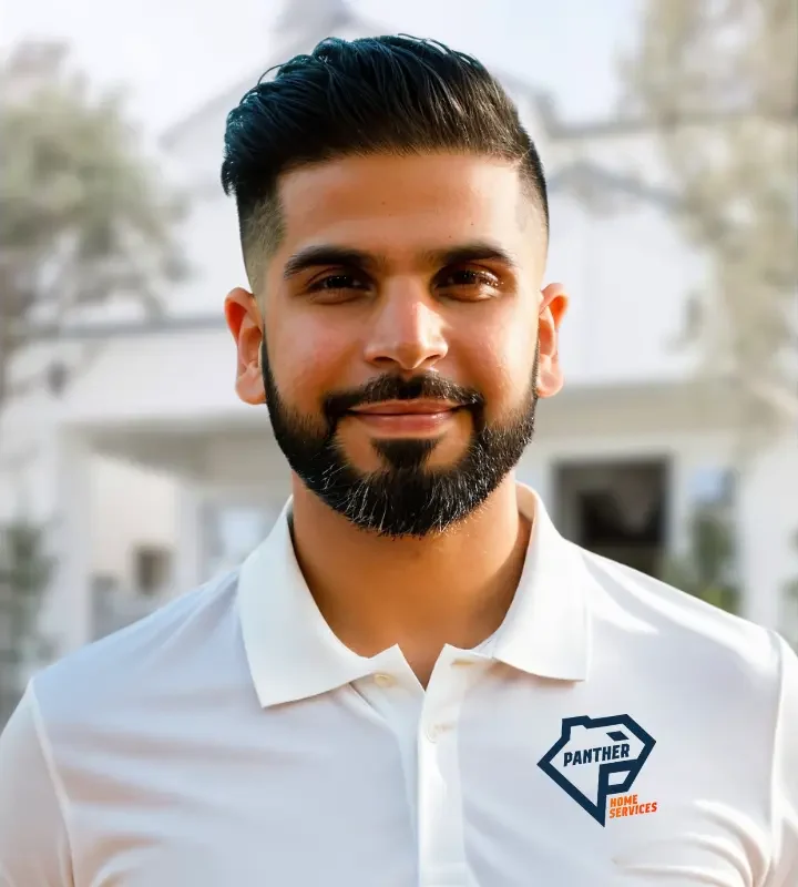 headshot of monty from panther home services smiling outdoors wearing a white polo shirt